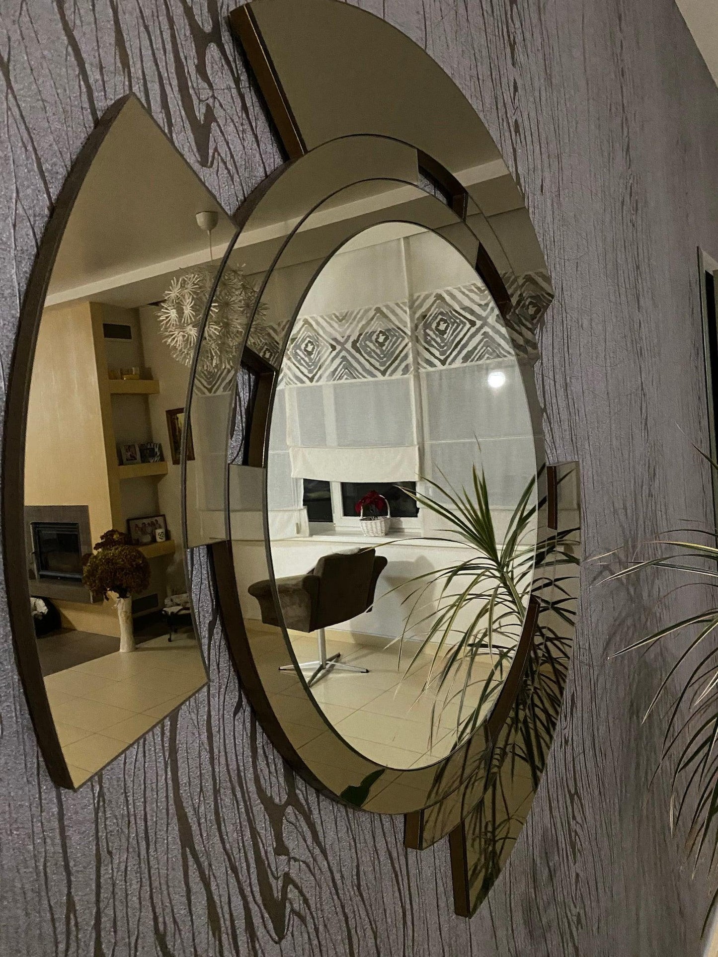 Cassandra's Radiance: Sleek Abstract Round Designer Luxury Decorative Mirror for Dressing Table