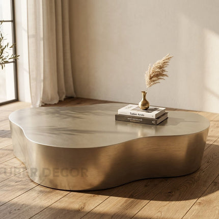 Selenga sculptural coffee table for modern lounge spaces inspired by contemporary European design with premium metal form and refined polish