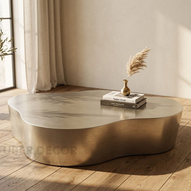 Selenga sculptural coffee table for modern lounge spaces inspired by contemporary European design with premium metal form and refined polish