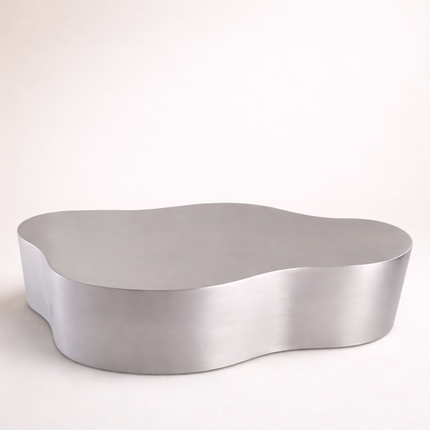 Selenga sculptural coffee table for modern lounge spaces inspired by contemporary European design with premium metal form and refined polish