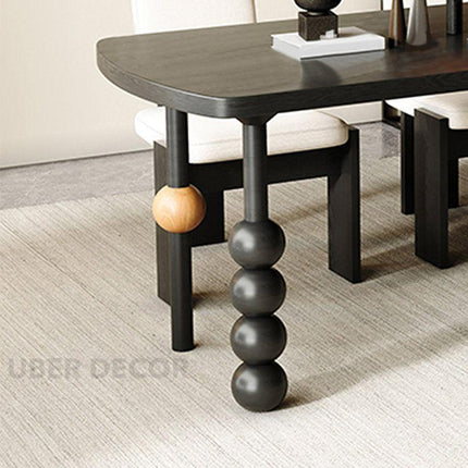 Eclat Noir Rectangular Dining Table Contemporary Artistic Design Black Finish Dual Tone Wooden Accented Sculptural Legs Ideal for Dining Room - Uber Decor
