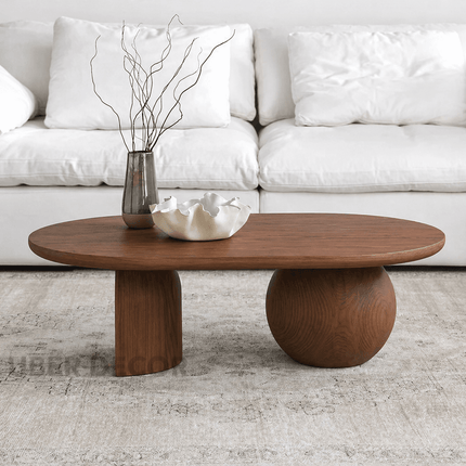 Magdalena Sculptural Mid Century Japandi Coffee Table with Organic Round Wooden Top and Sphere and Arched Block Legs