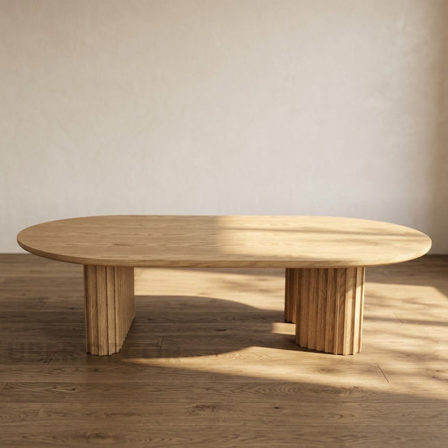 Sittang sculptural solid wood coffee table inspired by contemporary Scandinavian design for family room and lounge spaces