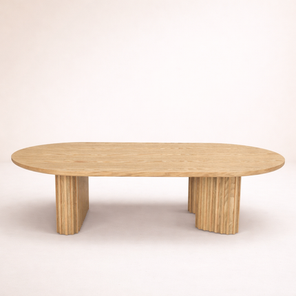Sittang sculptural solid wood coffee table inspired by contemporary Scandinavian design for family room and lounge spaces
