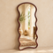 Medina maroon Moroccan floor mirror on a light beige background with boho apartment reflection